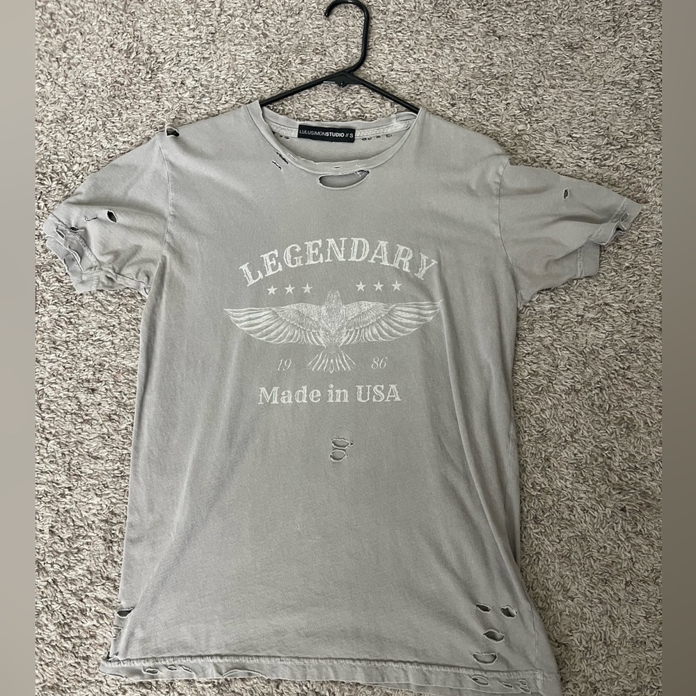Grey legendary USA shirt.